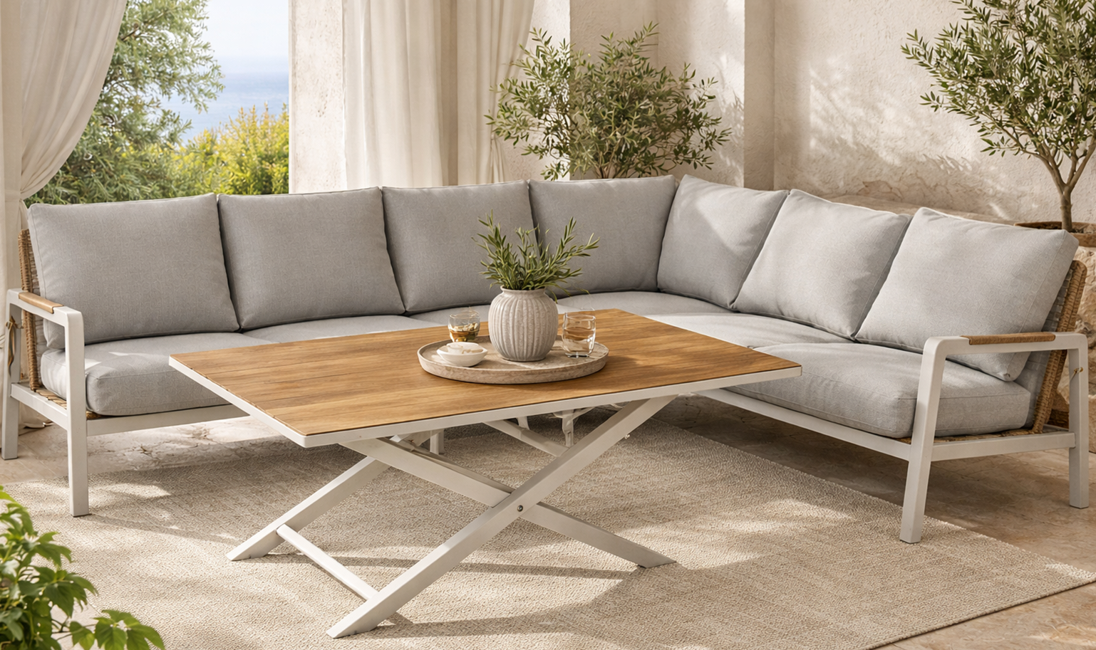 Modern outdoor sectional sofa with light grey cushions and a wood-top coffee table in a covered terrace setting